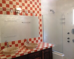 Combined shower/tub, hair dryer, towels, toilet paper