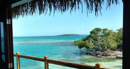 BELIZE PRIVATE ISLAND MIETE MIT ÜBER WASSERBUNGALOW