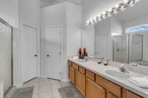 Combined shower/tub, hair dryer, towels, soap