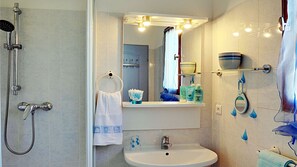Shower, eco-friendly toiletries, hair dryer, towels