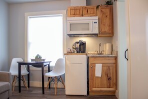 Fridge, microwave, coffee/tea maker, toaster