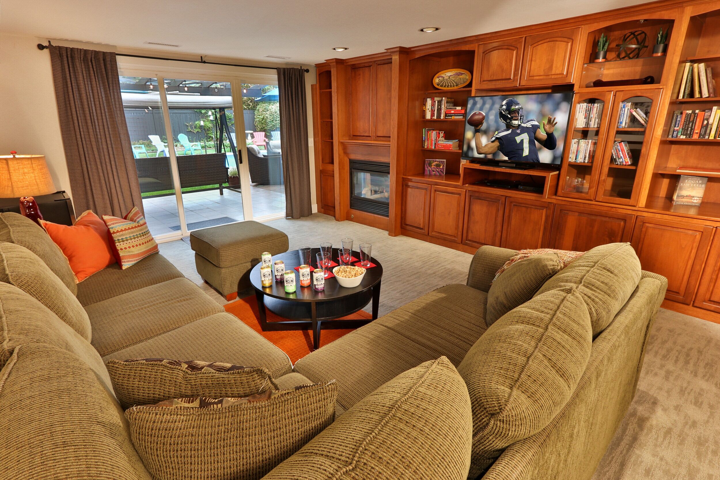 Smart TV, fireplace, foosball, books