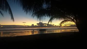 On the beach, sun loungers, beach towels