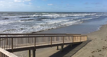 ON THE BEACH. Don't cross the busy highway with your family. SEASCAPE 2103