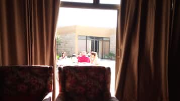 Breakfast, lunch served; local and international cuisine, pool views