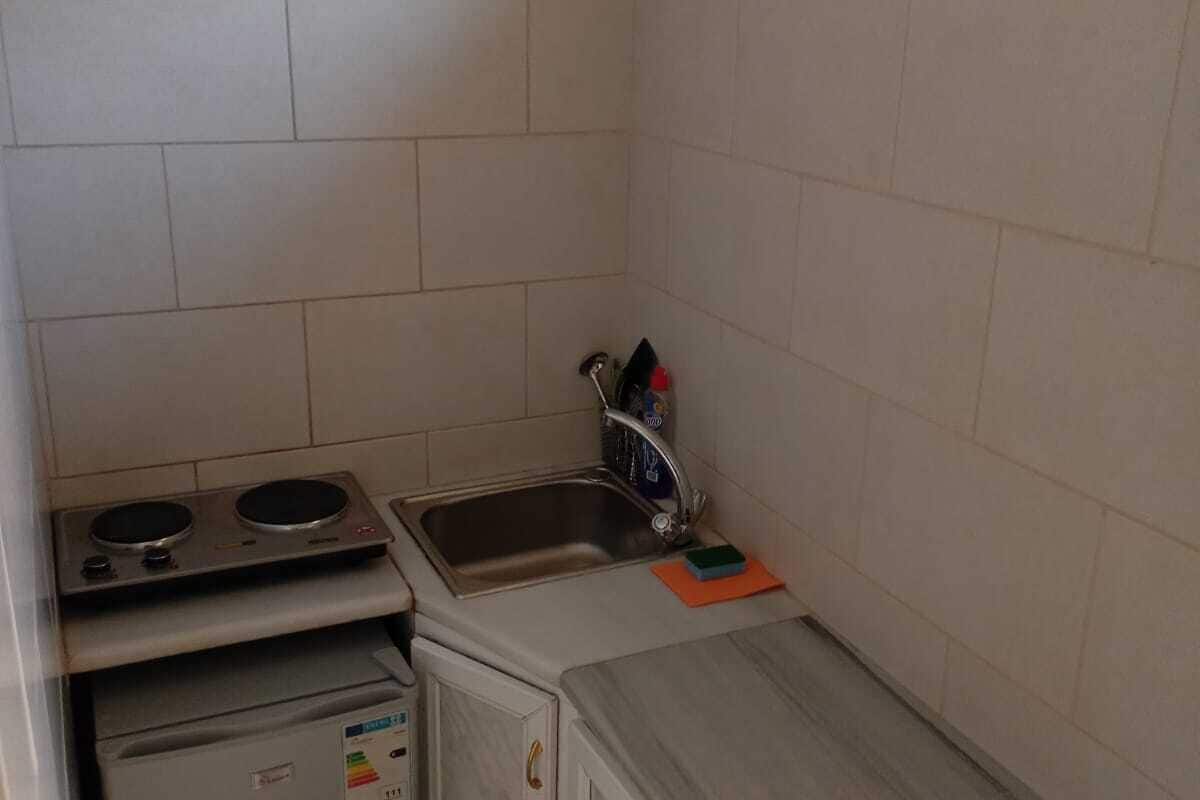 fridge, coffee/tea maker, dining tables