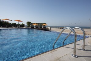 Outdoor pool, open 8:00 AM to 9:00 PM, pool loungers