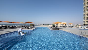 Outdoor pool, open 8:00 AM to 9:00 PM, pool loungers