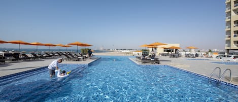 Outdoor pool, open 8:00 AM to 9:00 PM, sun loungers