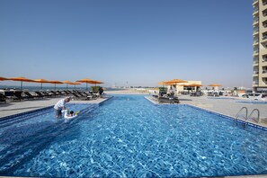 Outdoor pool, open 8:00 AM to 9:00 PM, sun loungers