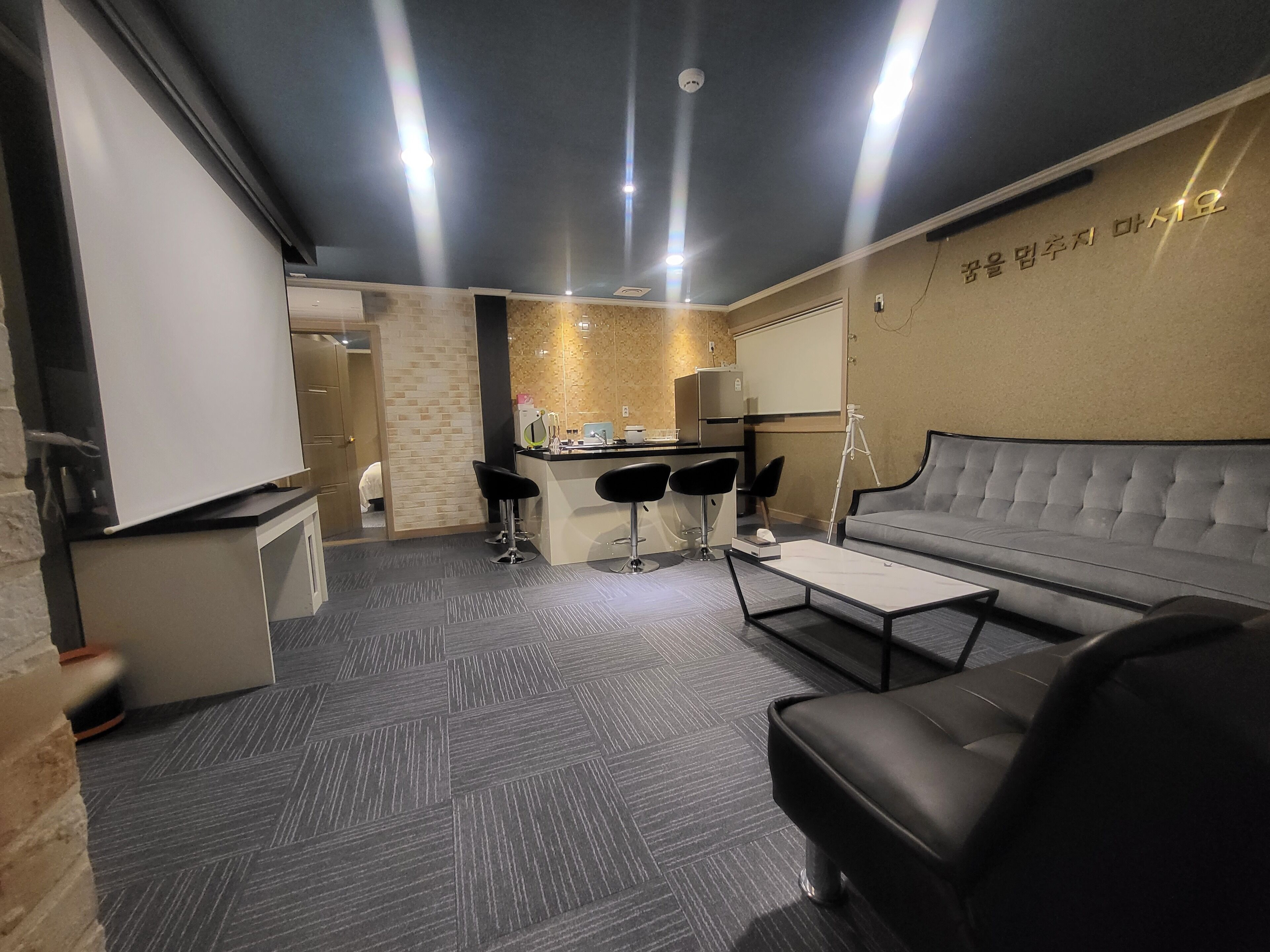 suite room (include caravan, bbq available, free netflix, styler, air purifier) | living area | 51-inch flat-screen tv with cable channels, tv, netflix