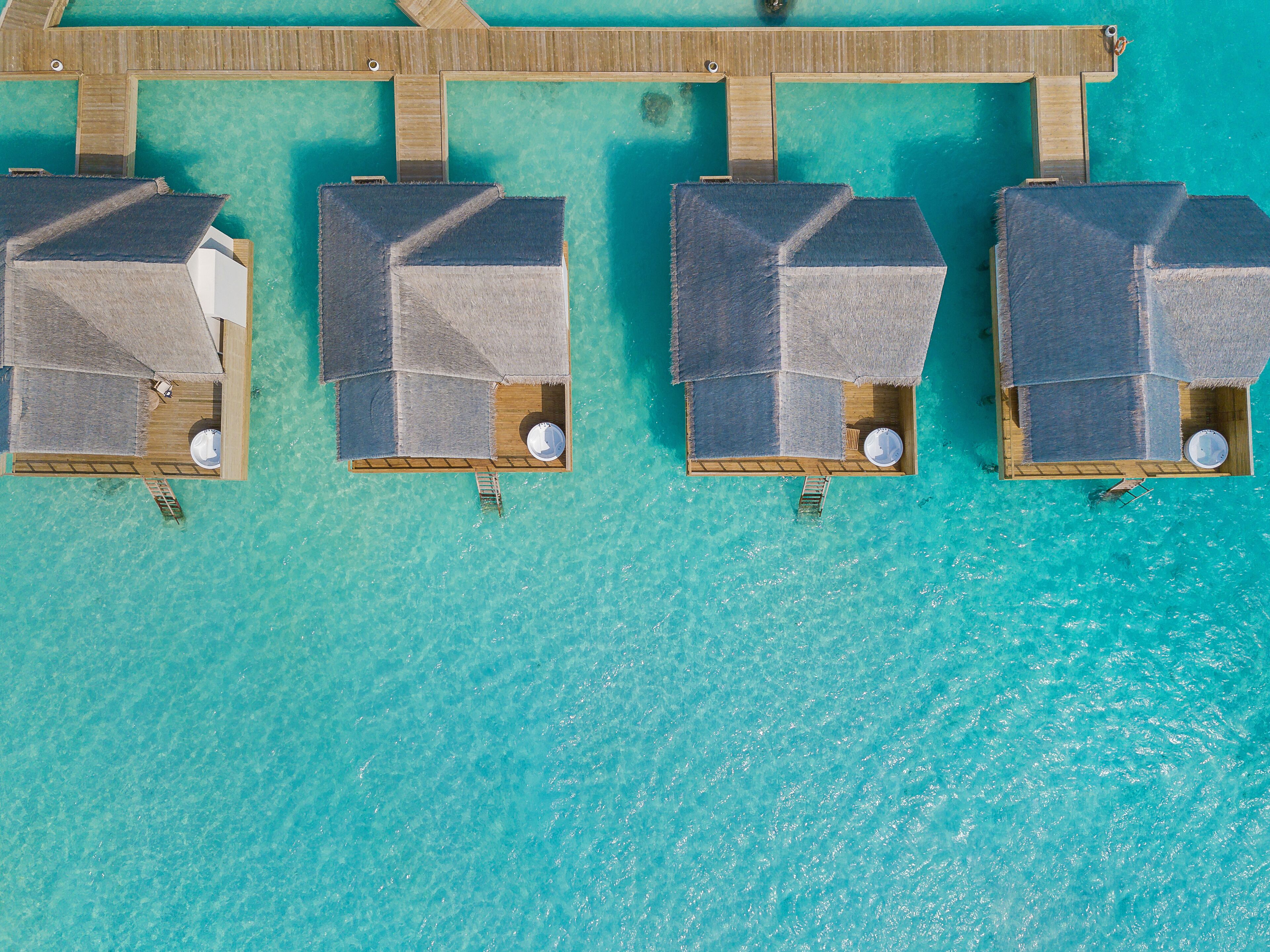 water villa with jacuzzi with free access to sea plane lounge on arrival | 1 bedroom, premium bedding, minibar, in-room safe