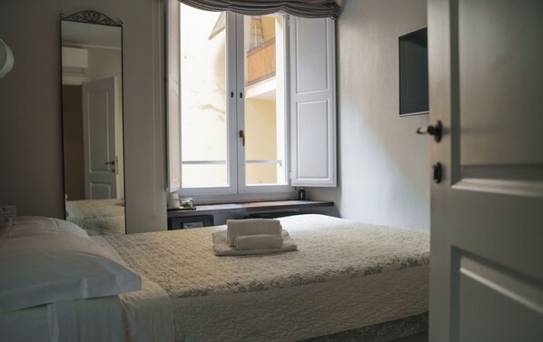 Premium bedding, memory-foam beds, free minibar, in-room safe