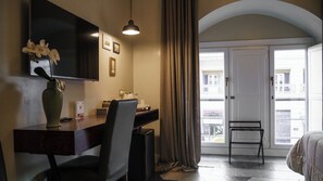 Premium bedding, memory-foam beds, free minibar, in-room safe