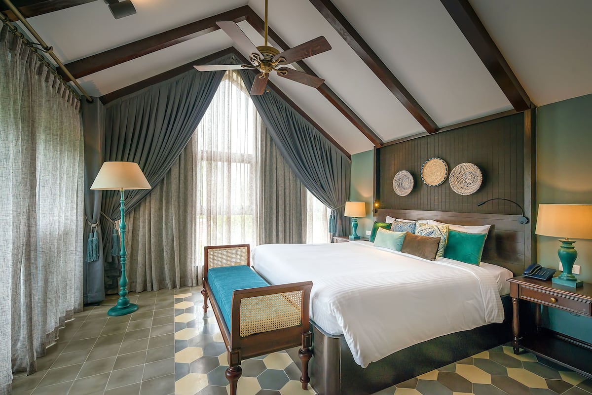 Attic Suite, Balcony | Minibar, in-room safe, desk, blackout curtains