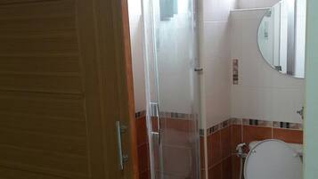 Shower, free toiletries, hair dryer, towels