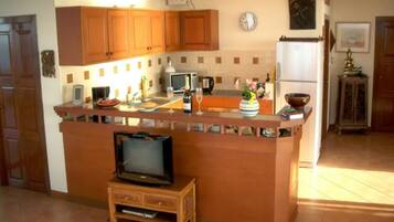 Villa, 4 Bedrooms, Sea View | Private kitchenette | Full-size fridge, microwave, electric kettle, cookware/dishes/utensils