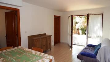 Apartment, 2 Bedrooms (Piedi nell'acqua 3) | Living area | Flat-screen TV