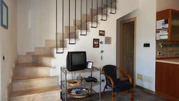 Apartment, 2 Bedrooms (Il Castello 1) | Living area | Flat-screen TV