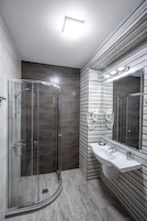Junior Suite, Balcony | Bathroom | Free toiletries, hair dryer, towels