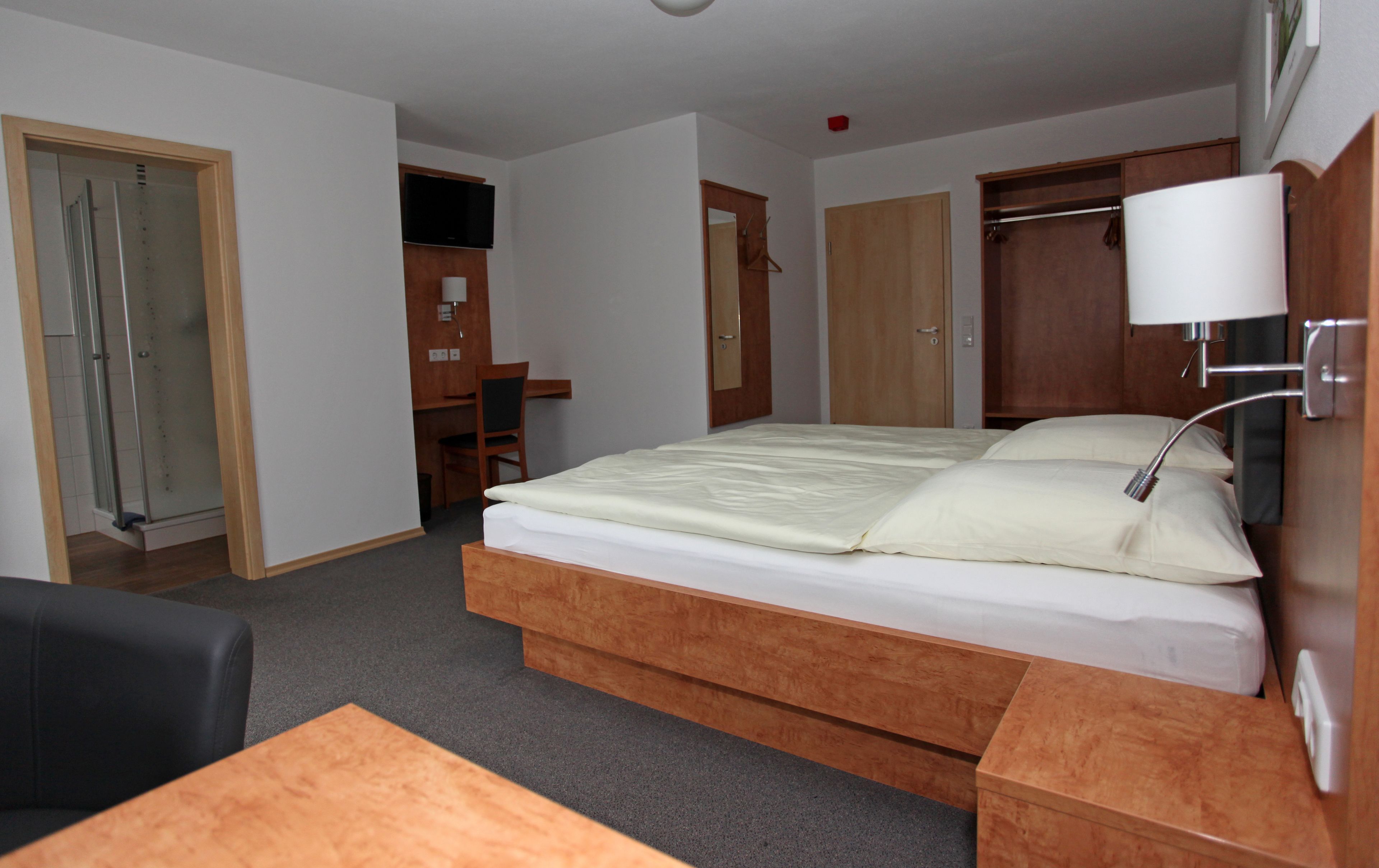 double room | premium bedding, desk, blackout curtains, soundproofing
