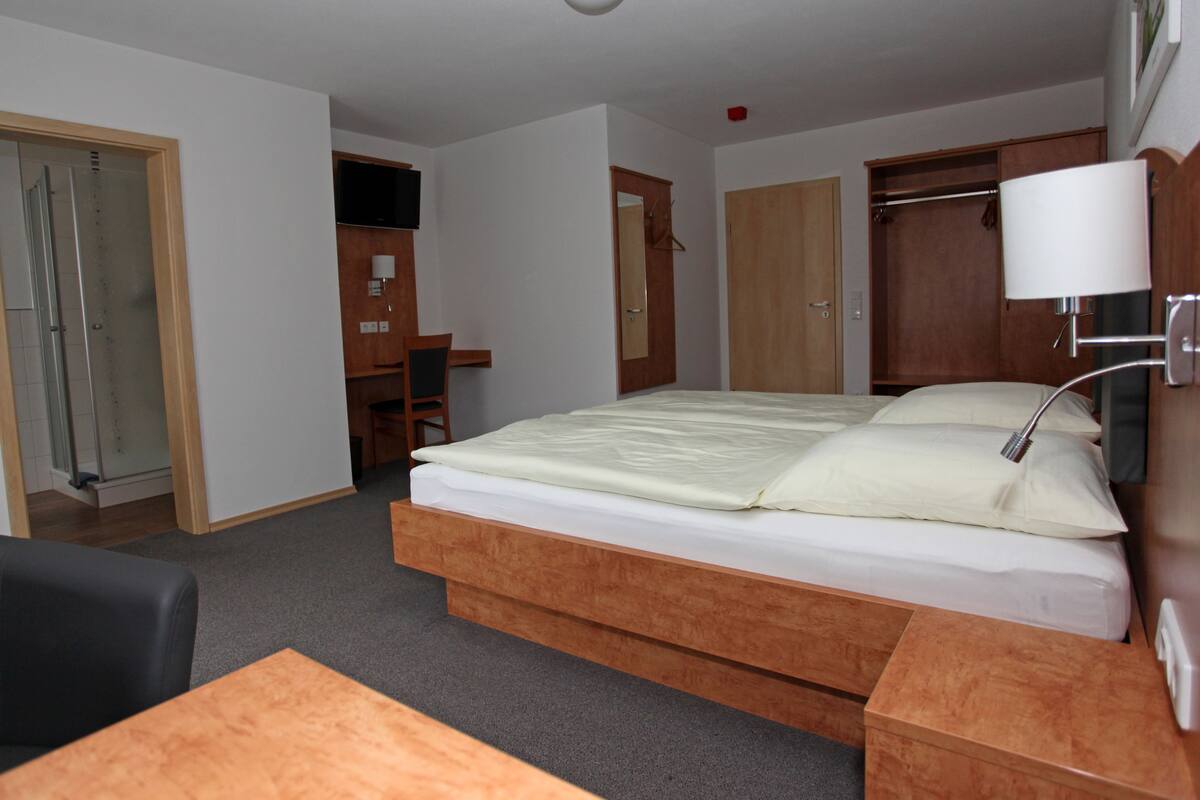 double room | premium bedding, desk, blackout curtains, soundproofing