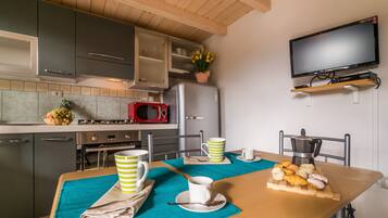 Apartment, 1 Bedroom (Casa Pedra) | In-room dining
