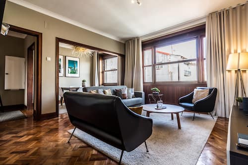 Standard Apartment, 3 Bedrooms | Living room | Flat-screen TV