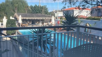 Deluxe Pool Room | 1 bedroom, premium bedding, minibar, in-room safe
