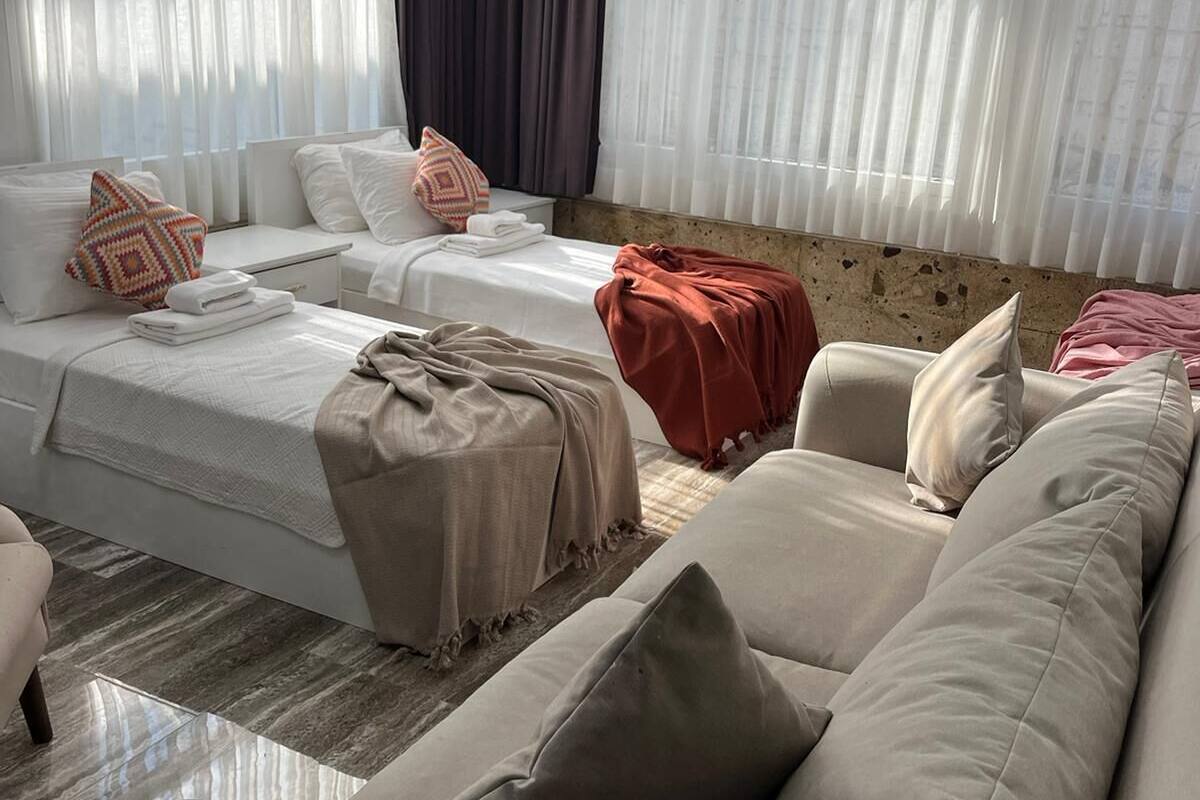 Familienzimmer | Hochwertige Bettwaren, Minibar, Zimmersafe, Verdunkelungsvorhänge