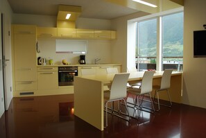 Design Apartment, 2 Bedrooms | Living area | Flat-screen TV