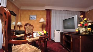 Minibar, desk, laptop workspace, iron/ironing board