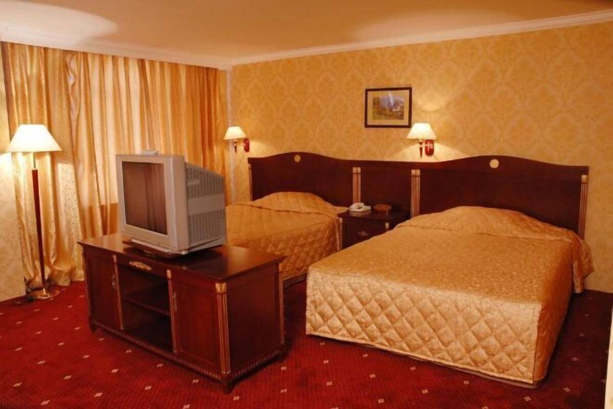 Minibar, desk, laptop workspace, iron/ironing board