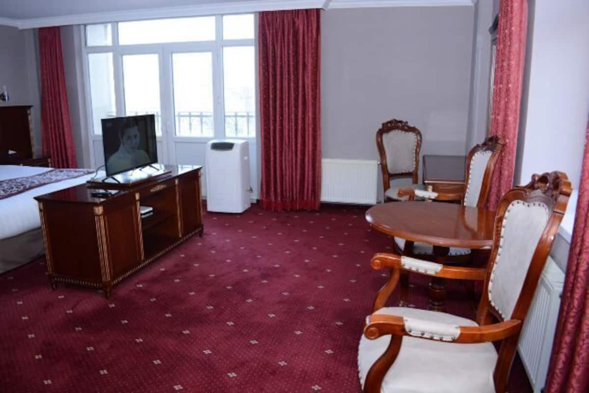Minibar, desk, laptop workspace, iron/ironing board