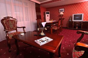 Deluxe Suite Double | Living room | 40-inch LED TV with satellite channels