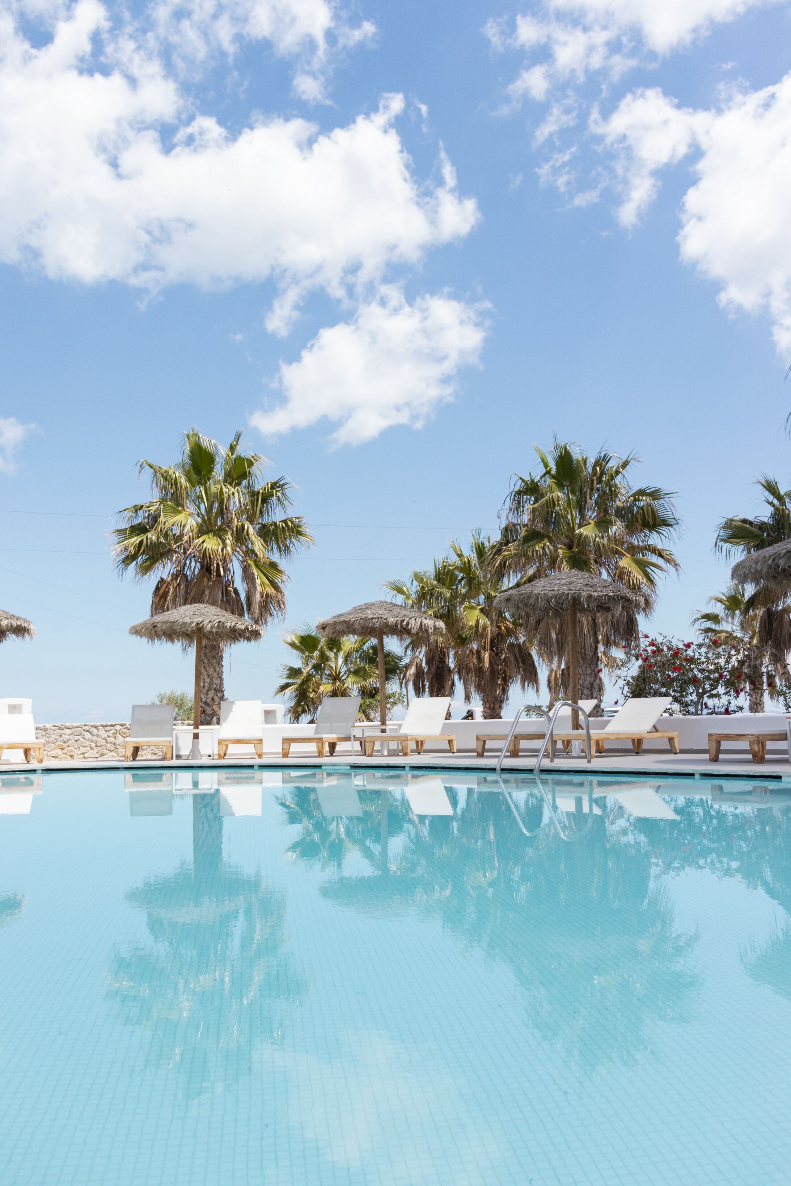 outdoor pool, pool umbrellas, pool loungers