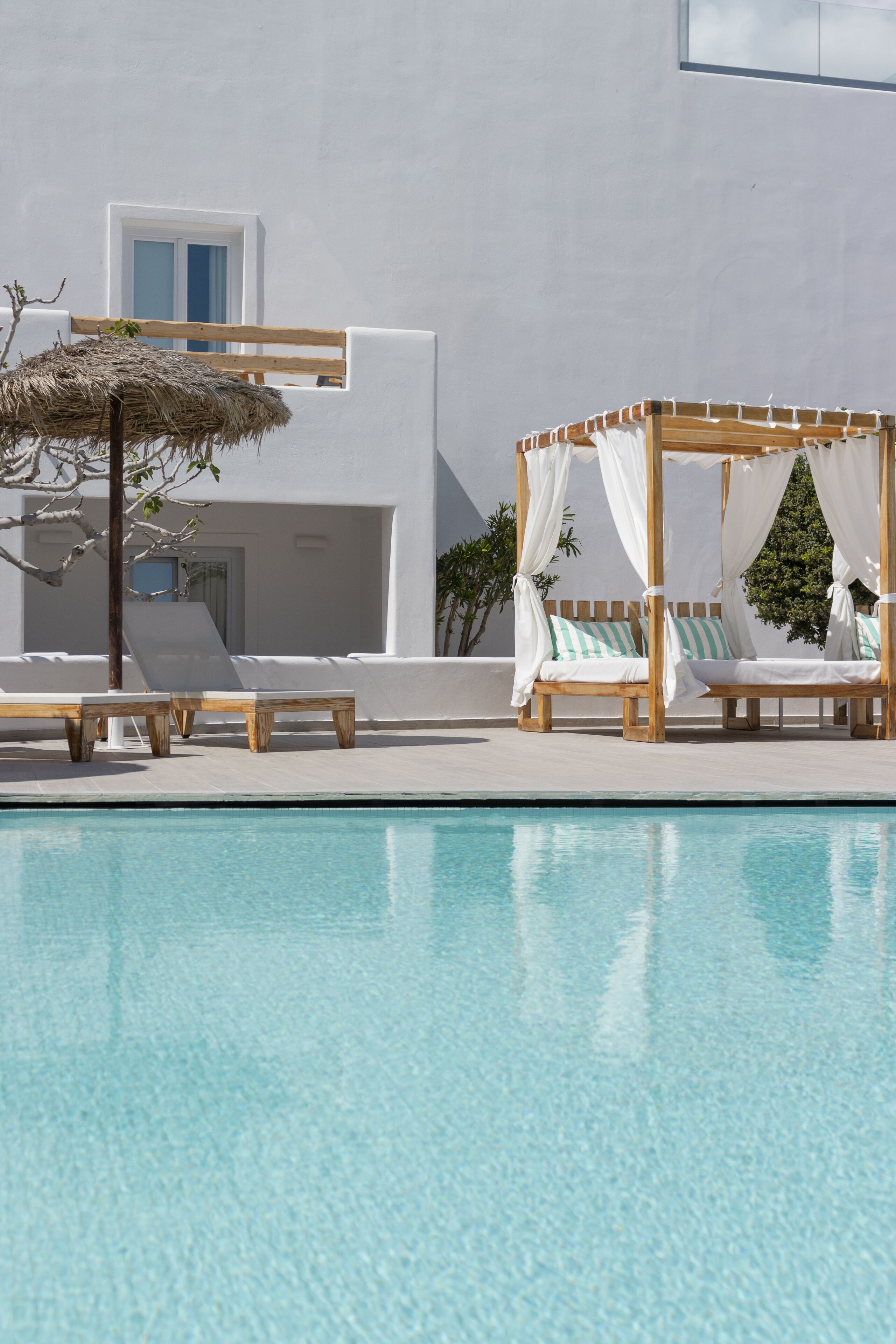 outdoor pool, pool umbrellas, pool loungers