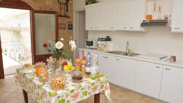 Fridge, stovetop, cookware/dishes/utensils