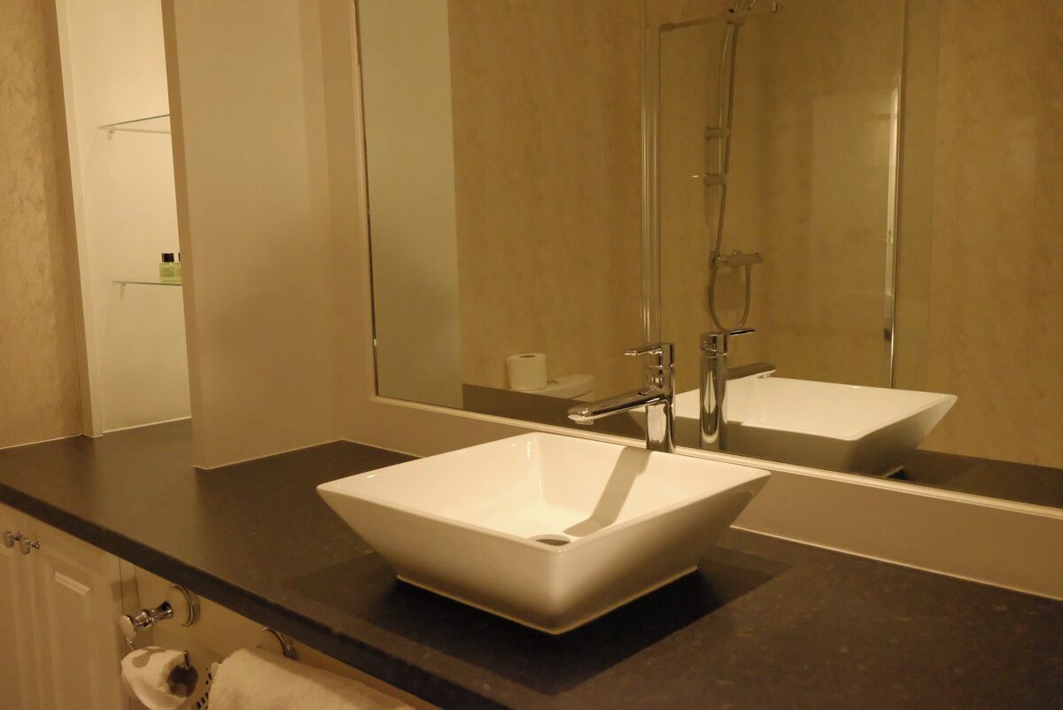superior double room | bathroom | hair dryer, towels, soap, shampoo