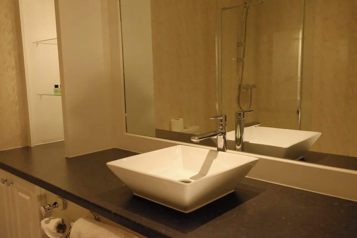 superior double room | bathroom | hair dryer, towels, soap, shampoo