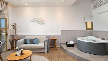 Suite, 1 Bedroom, Hot Tub, Sea View | In-room safe, desk, soundproofing, iron/ironing board