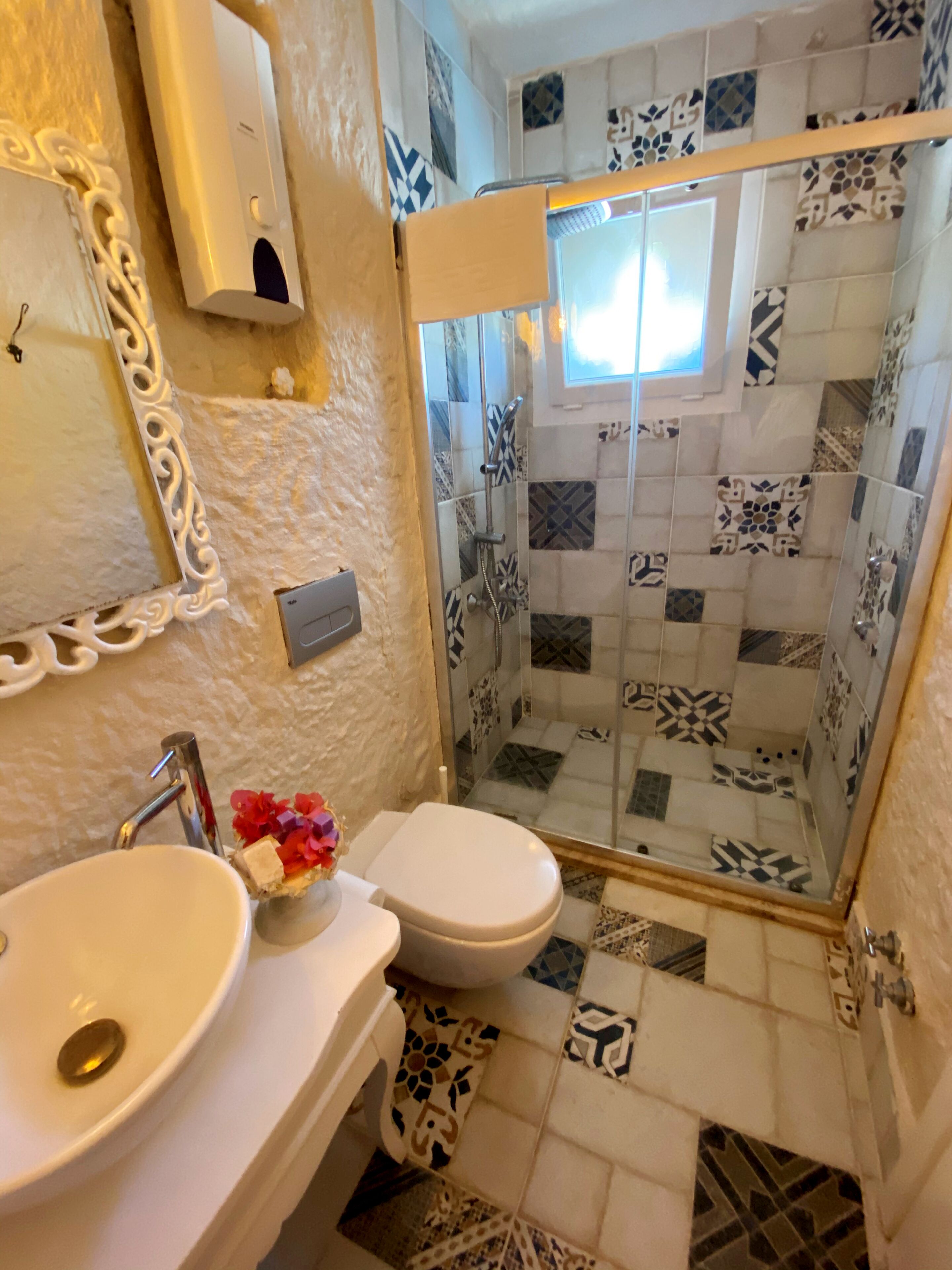 deluxe room | bathroom | shower, free toiletries, hair dryer, slippers