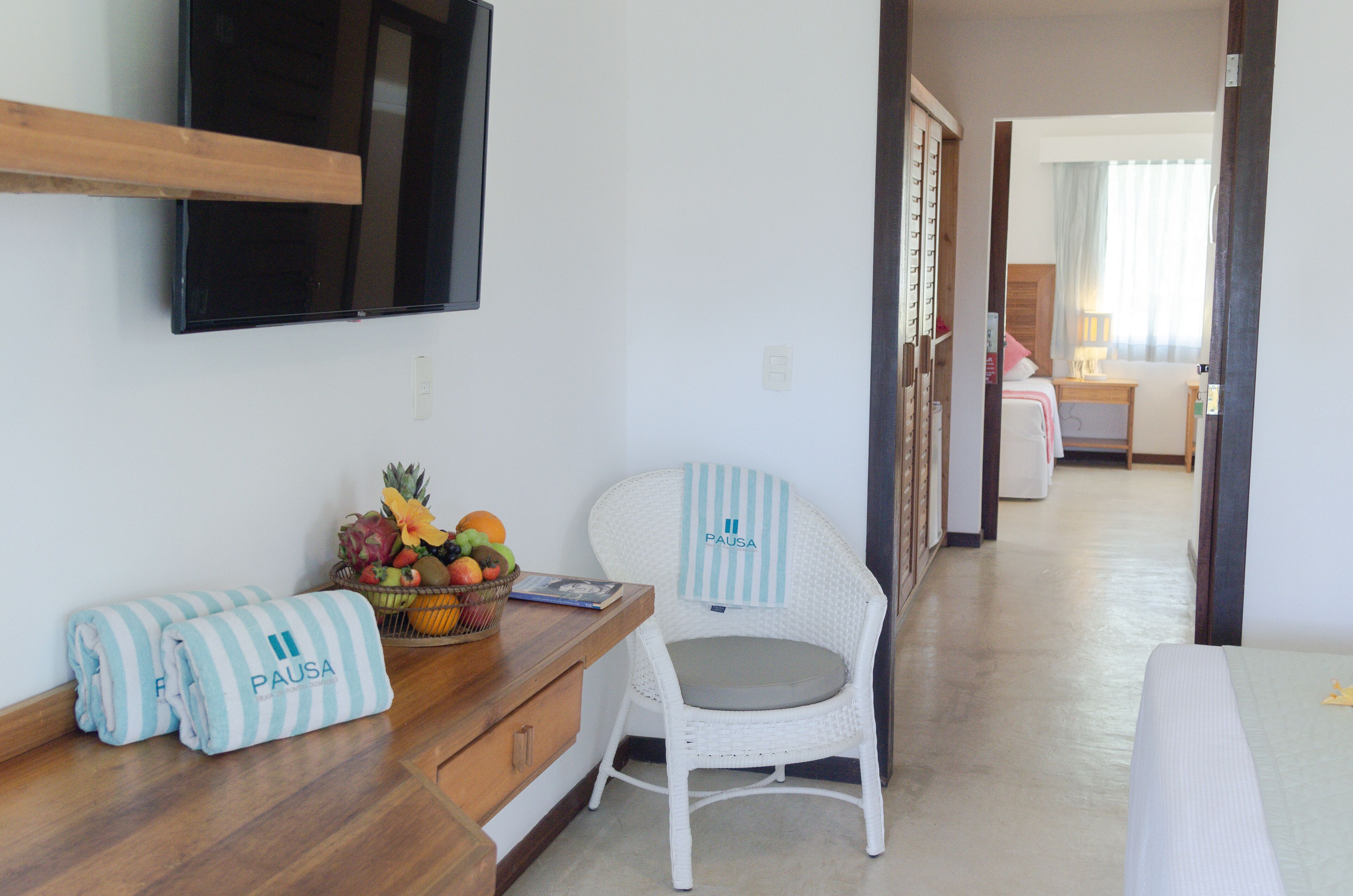 family room | 1 bedroom, minibar, in-room safe, desk