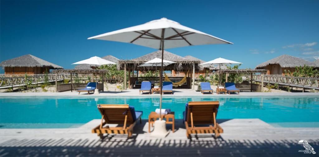 Indoor pool, pool umbrellas, sun loungers