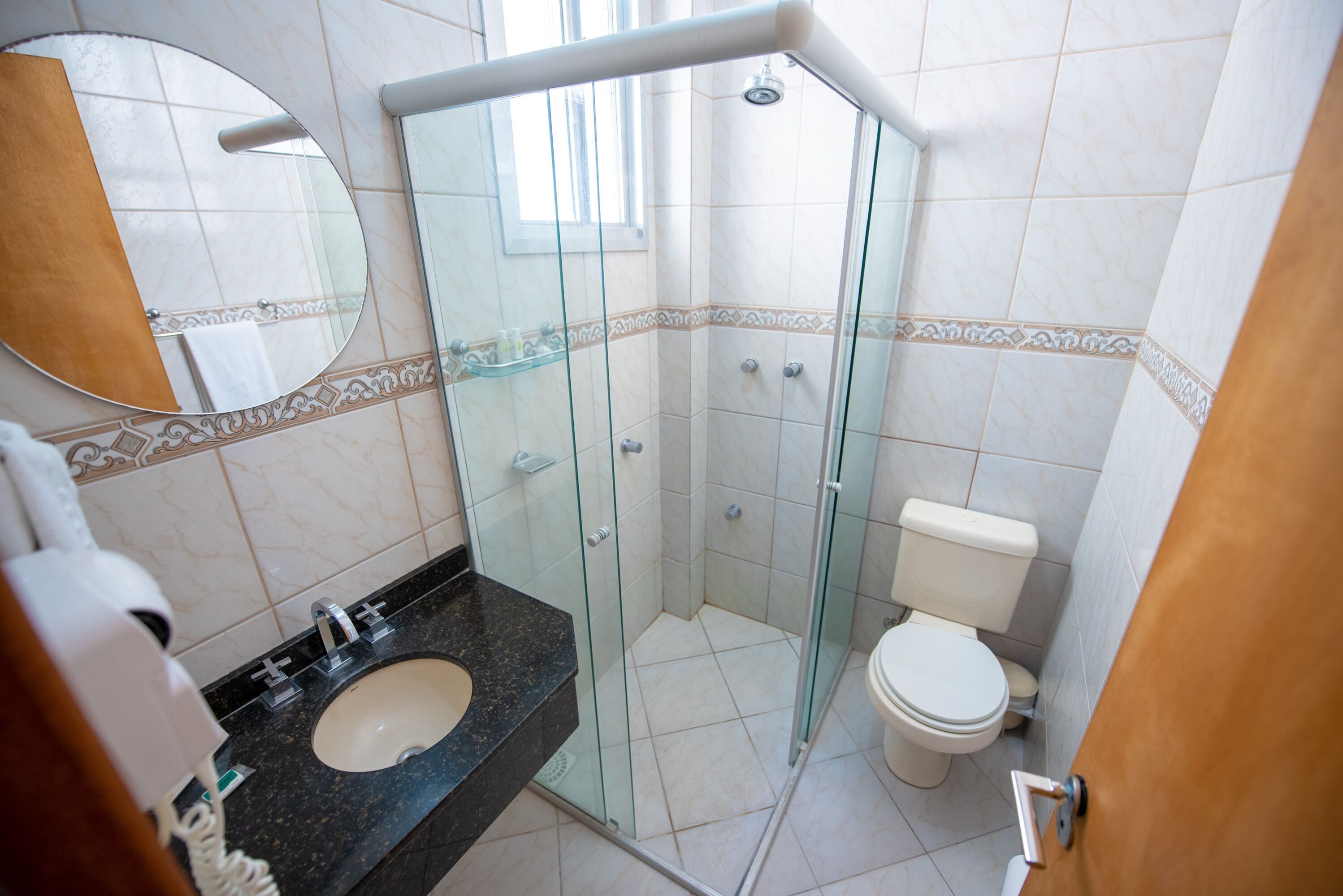 shower, free toiletries, hair dryer, towels