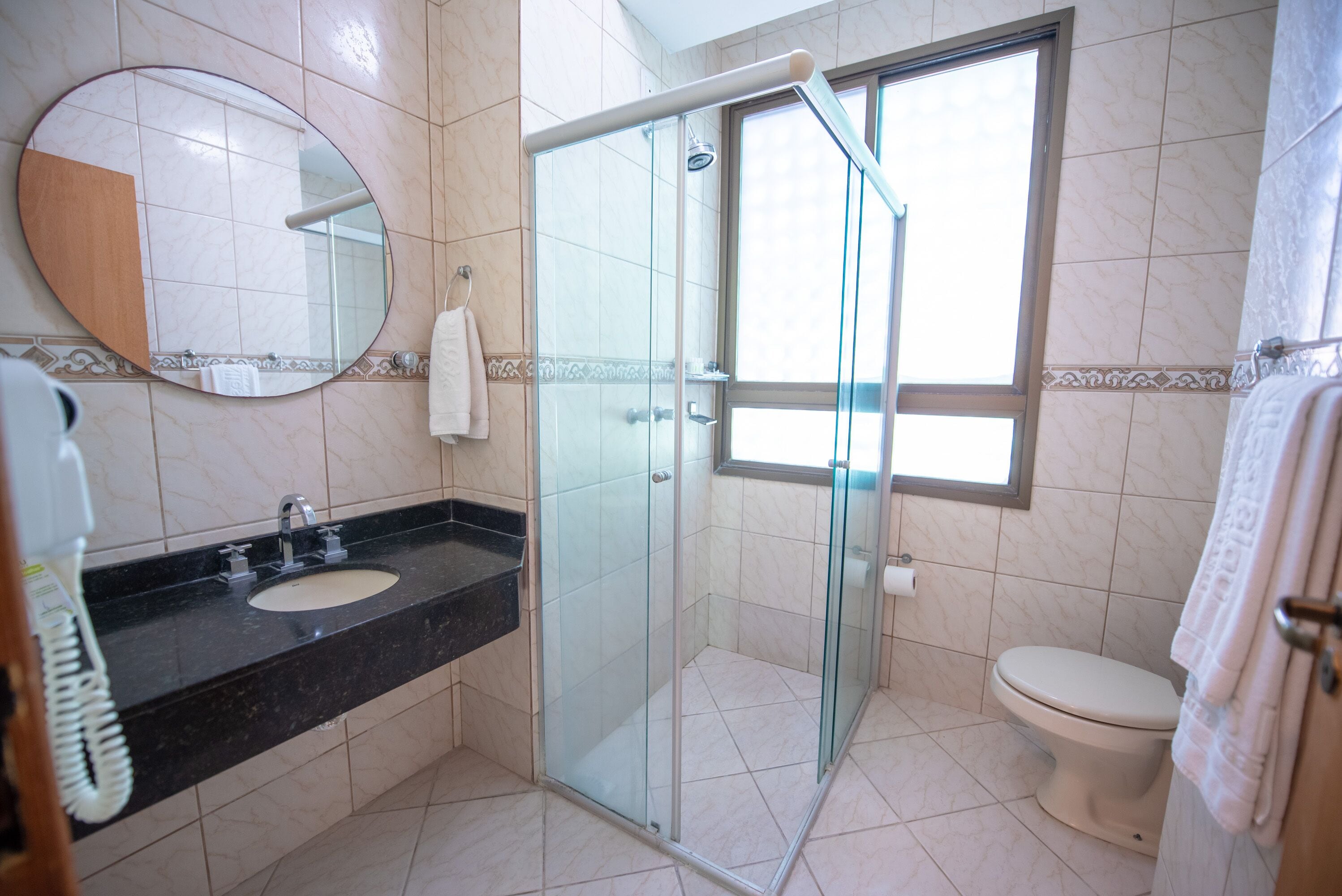 shower, free toiletries, hair dryer, towels