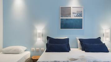 Quarto Vista Jardim | Frigobar, individualmente mobiliados, cortinas blackout