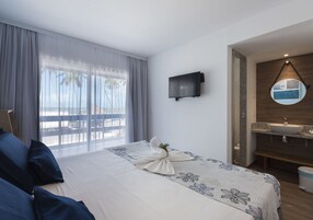 Standard frente Mar | Frigobar, individualmente mobiliados, cortinas blackout
