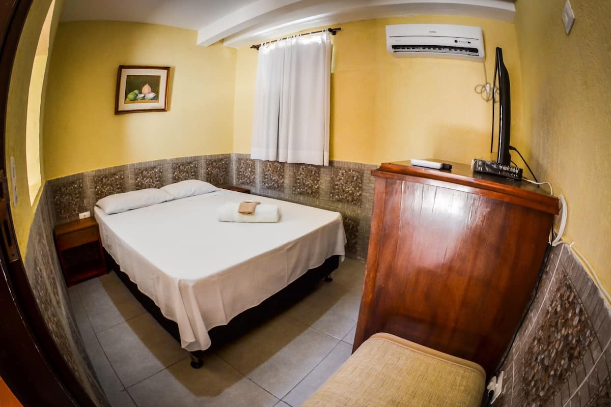 Standard Quadruple Room | Minibar, blackout drapes, iron/ironing board (on request), WiFi (free)