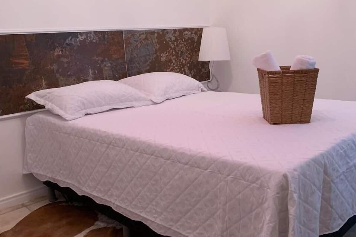 Economy Twin Room | Minibar, blackout drapes, iron/ironing board (on request), WiFi (free)